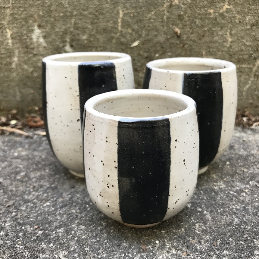 black and white striped ceramic cups